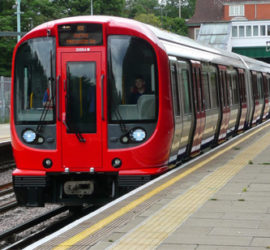 Underground train pulling into a station