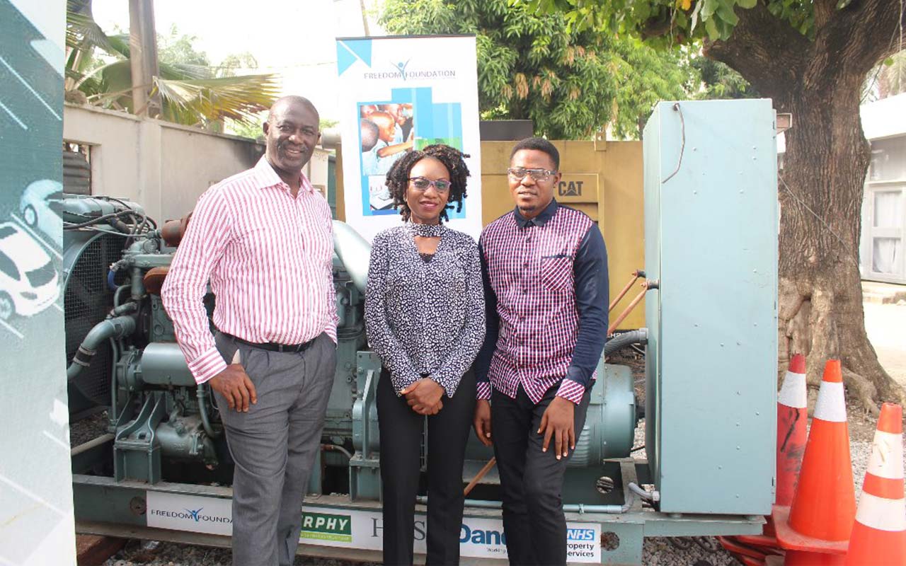 Delegates from the Freedom Foundation in front of the generator