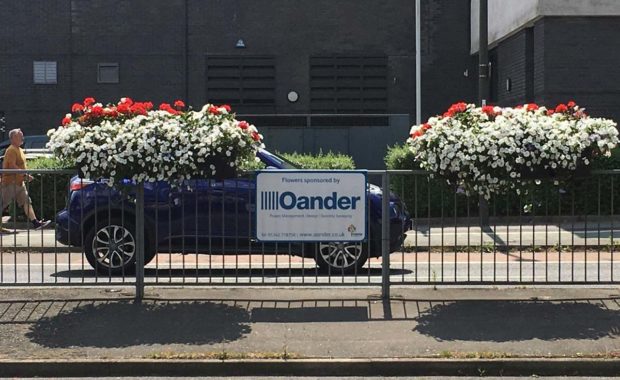 Crawley flower boxes on the roadside sponsored by Oander