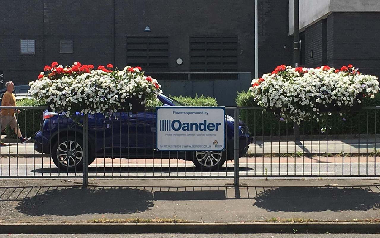 Crawley flower boxes on the roadside sponsored by Oander