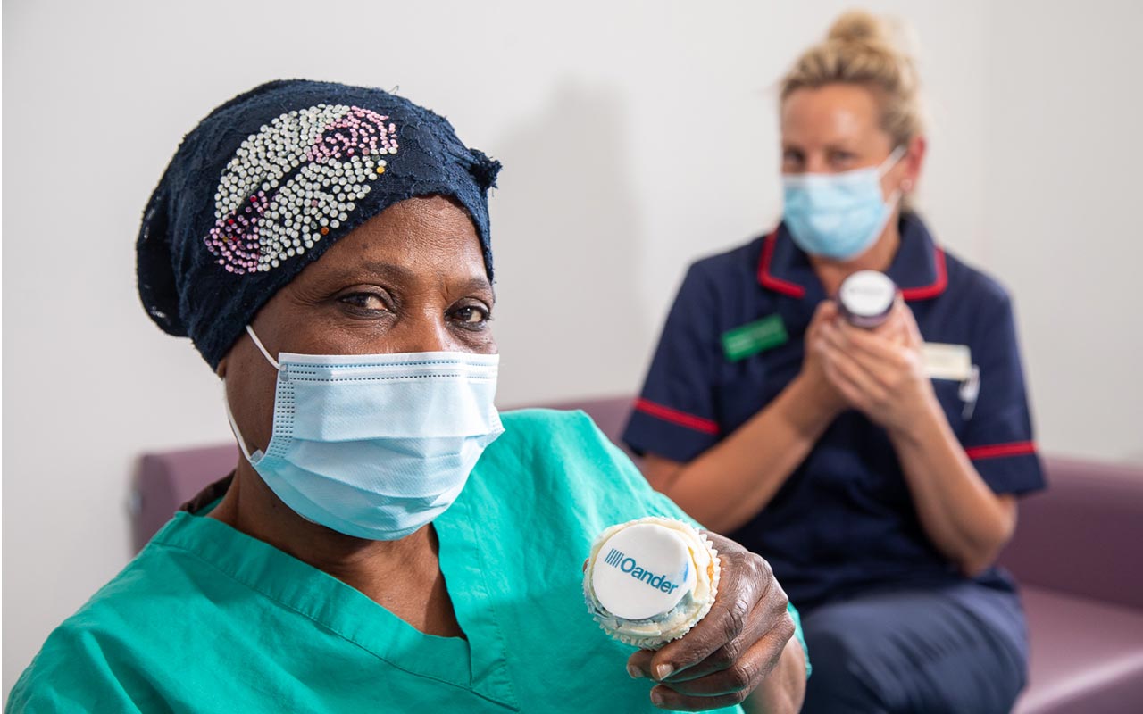 nurses take a break with a cake in  new facility created for ICU Rest Project